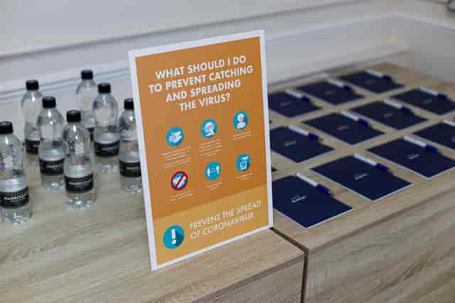 On 5 Suite meeting setup at Ascot Racecourse with health precautions and organized supplies.