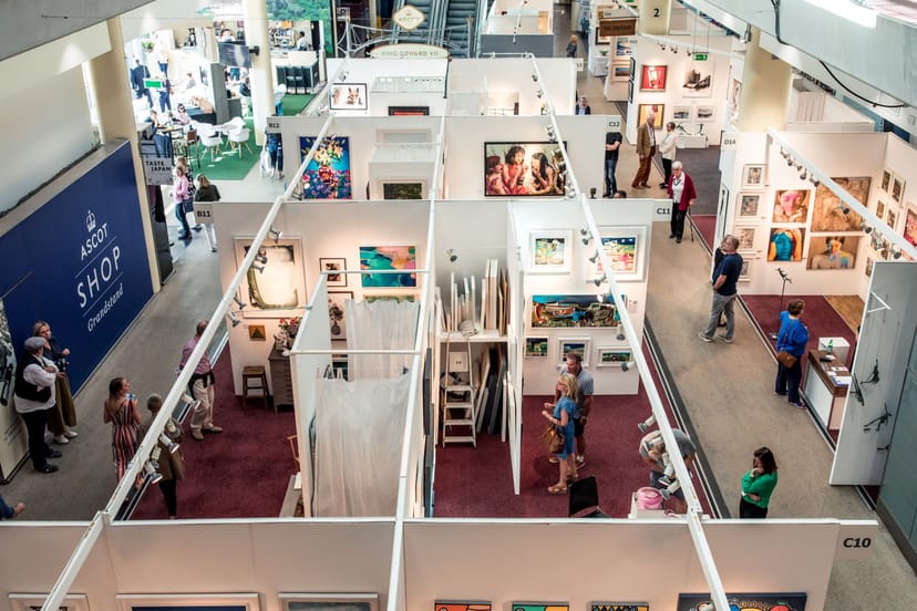 "Ascot Racecourse Grandstand Concourse art exhibition with vibrant displays and attendees"