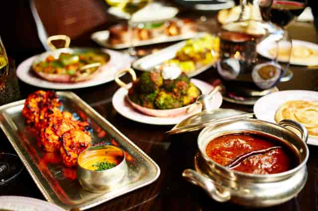 Private Dining Vault V20 at Gymkhana with gourmet dishes for corporate events.