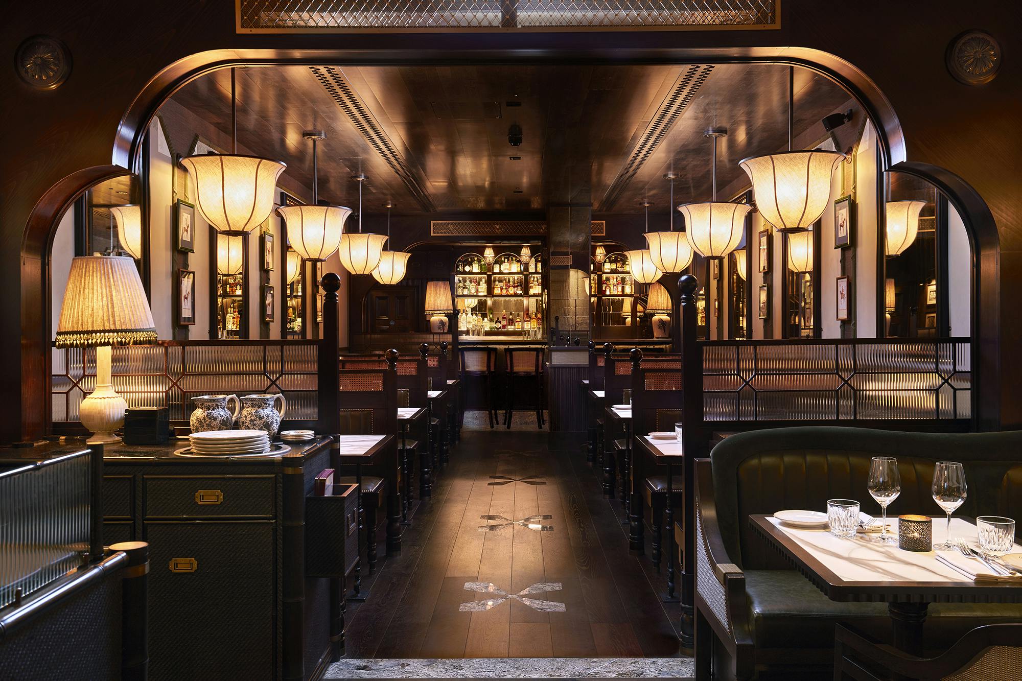 Sophisticated dining space at Gymkhana for corporate events and intimate gatherings.