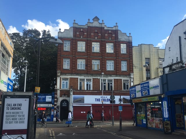 Vibrant urban event space at 133 Rye Lane, featuring historical architecture.