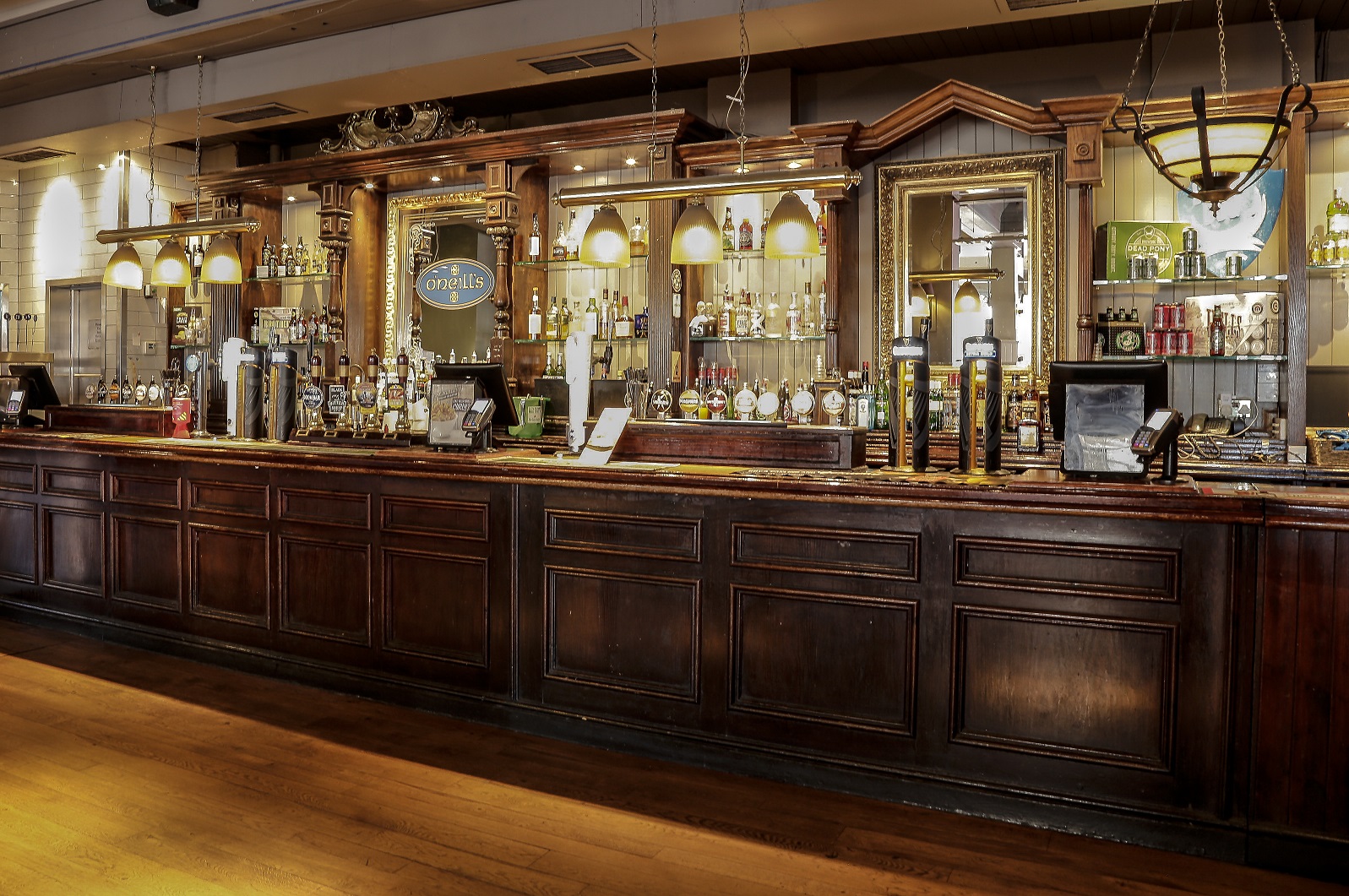 Elegant bar area in O'Neill's Kings Cross, perfect for cocktail receptions and networking events. - Banner