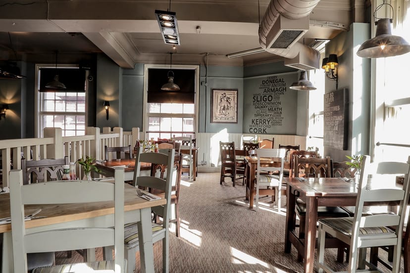 Private function room at O'Neill's Kings Cross, cozy dining space for intimate events.