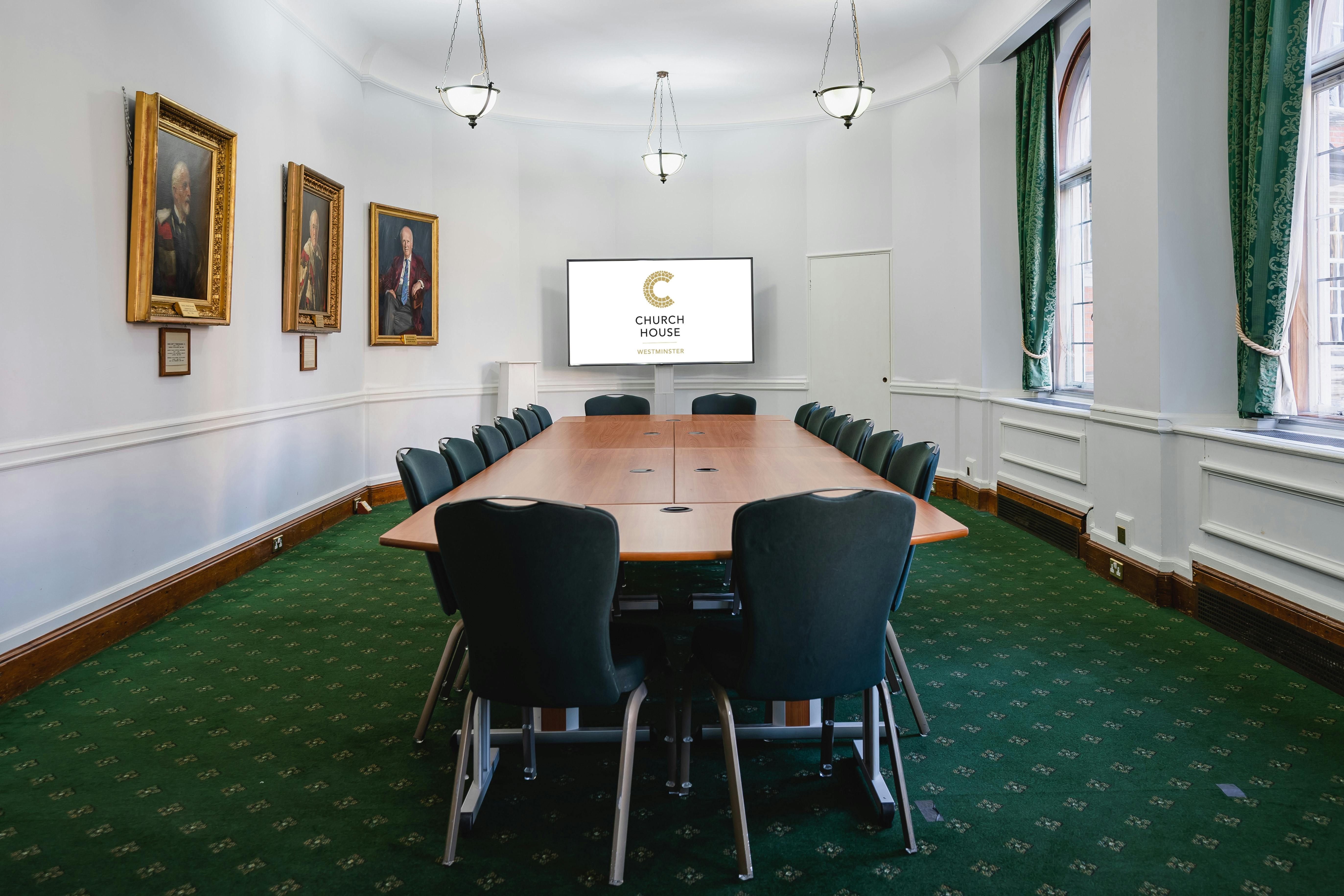 Council Room in Church House Westminster with long wooden table for professional meetings.