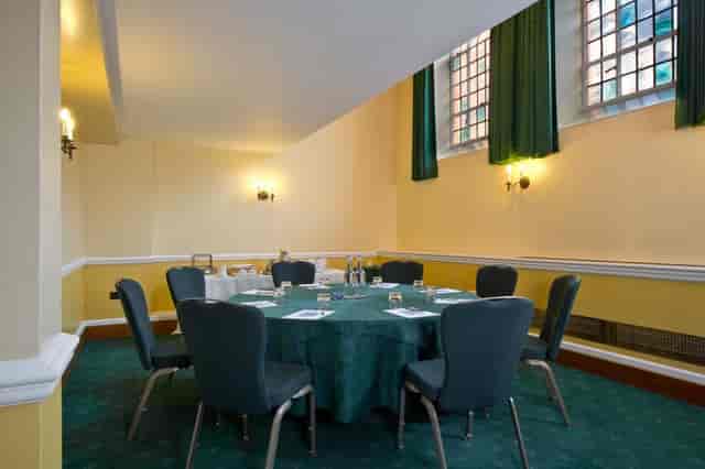 Bishops' Robing Room, round table meeting space, ideal for gatherings and brainstorming.
