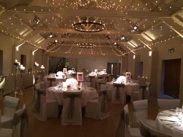Elegant ballroom at Stoke Place with fairy lights, perfect for weddings and events.