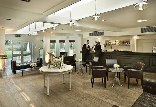 Lakeside reception area with elegant furnishings for meetings and events.