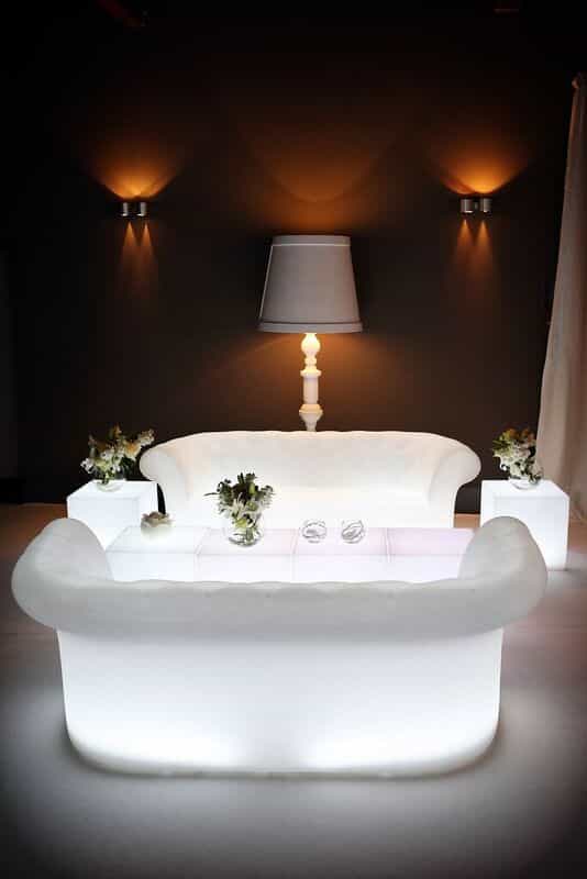 Stylish lounge at Lakeside, Stoke Place with white furniture for upscale events.