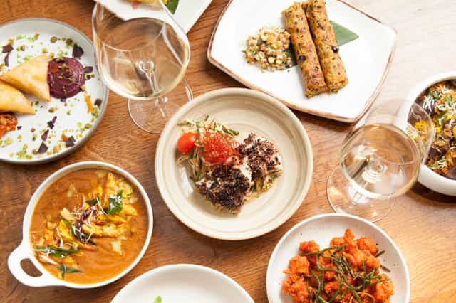 Exclusive Venue Hire in Trishna with vibrant dishes for catered events and networking.