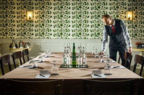 Lower Garden Room at Stoke Place, elegant table setup for corporate events and gatherings.