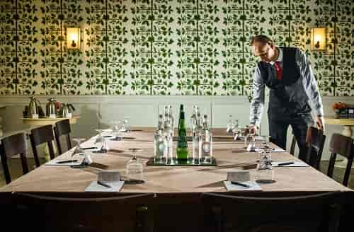 Lower Garden Room at Stoke Place, elegant table setup for corporate events and gatherings.