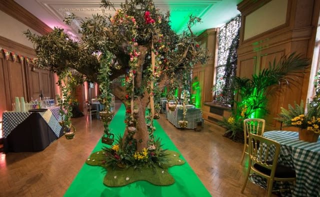 Whole Venue at Shrek's Adventure! London with decorative tree, ideal for enchanting events.