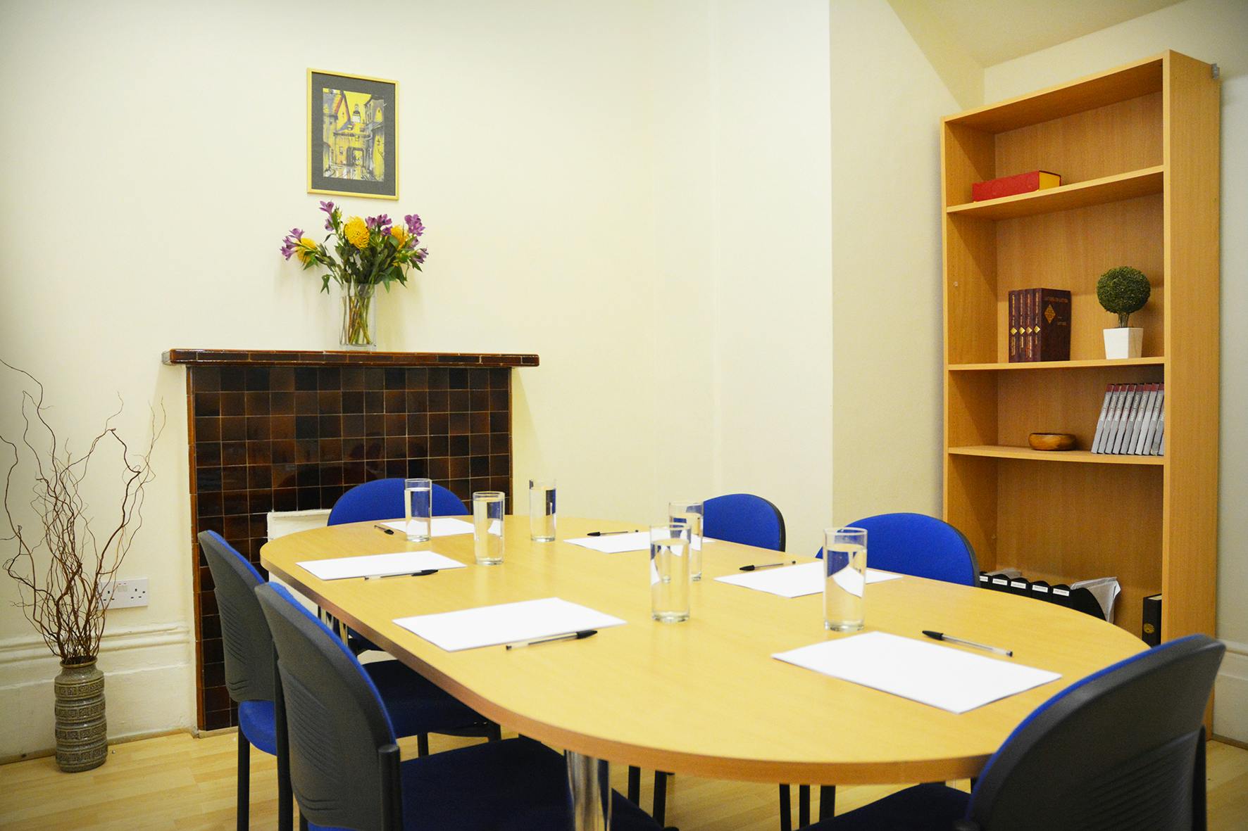 Queensborough Meeting Room with round table setup for workshops and gatherings.