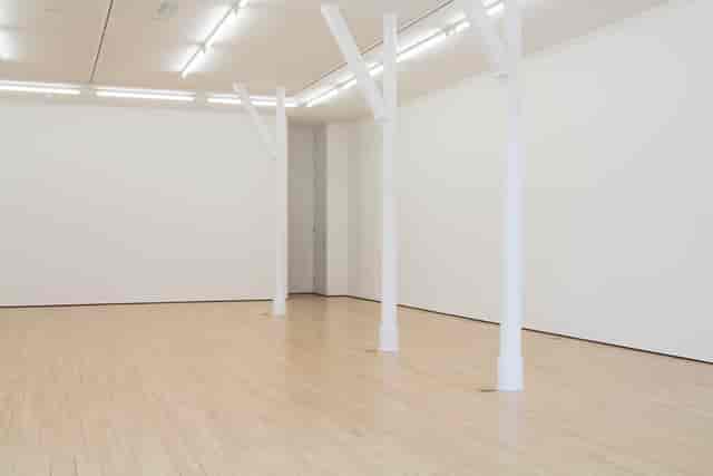 Spacious minimalist event venue in Staffordshire with natural light for corporate meetings.