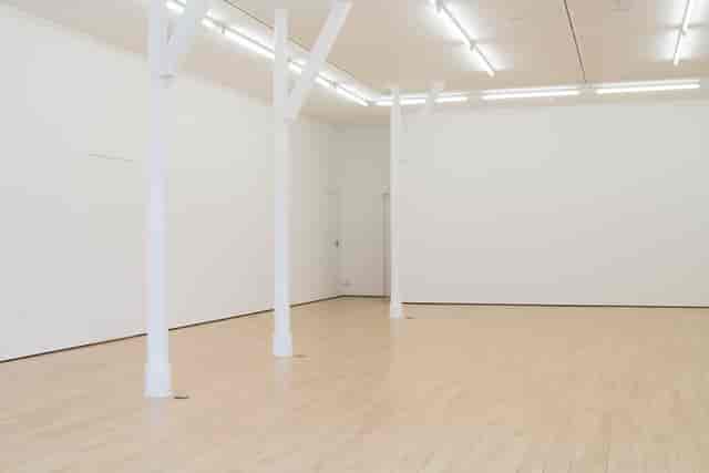 Spacious minimalist event venue in Staffordshire with natural light for corporate meetings.