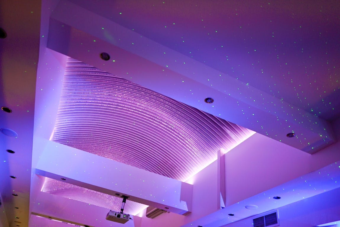 Porter Hall at Wesley Euston Hotel, modern event space with elegant ceiling and ambient lighting.