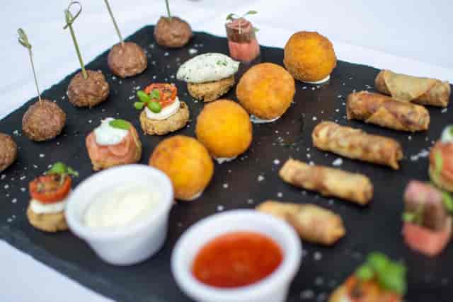 Gourmet hors d'oeuvres platter in Camden Suite, ideal for cocktail receptions and events.