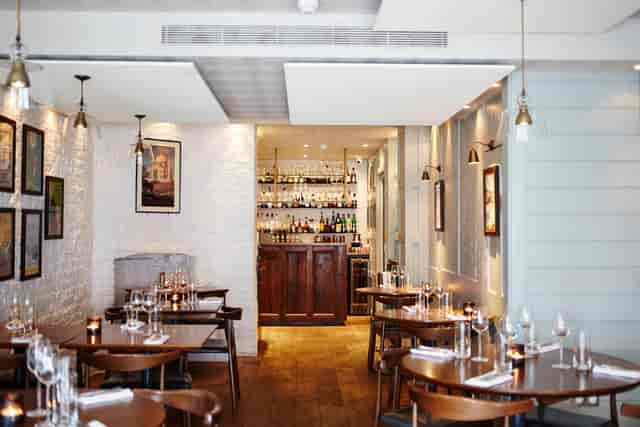 Stylish restaurant interior in Trishna for intimate gatherings and corporate events.