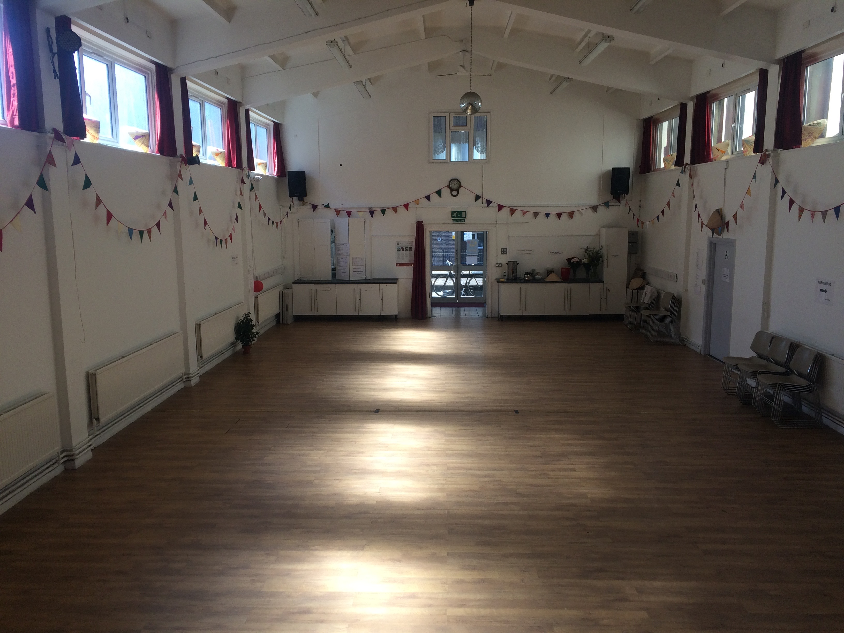 Spacious Main Hall at Centre 151, ideal for workshops and social gatherings. - Banner