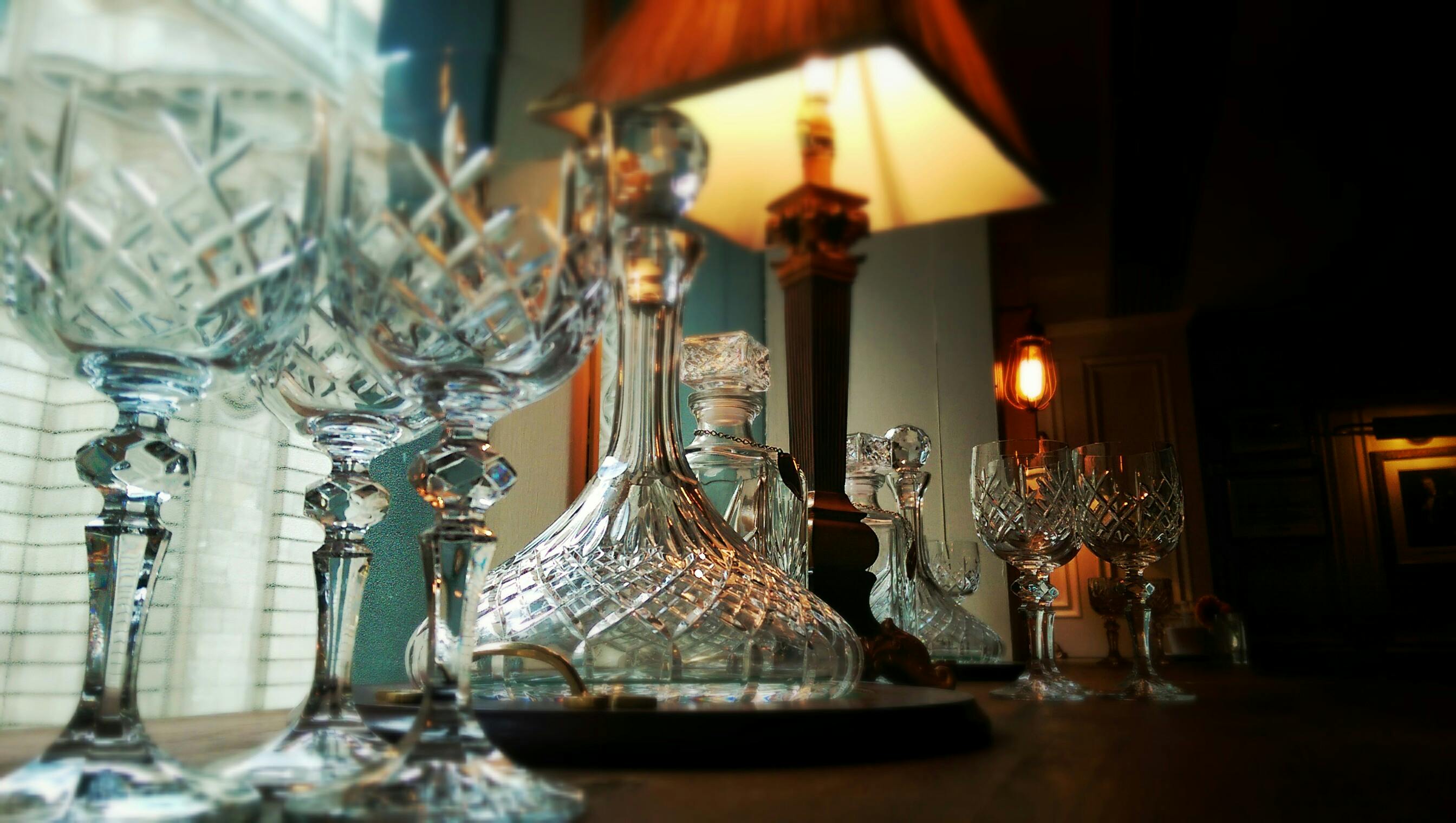 Elegant crystal glassware in The Admiral's Cabin for upscale events and receptions.