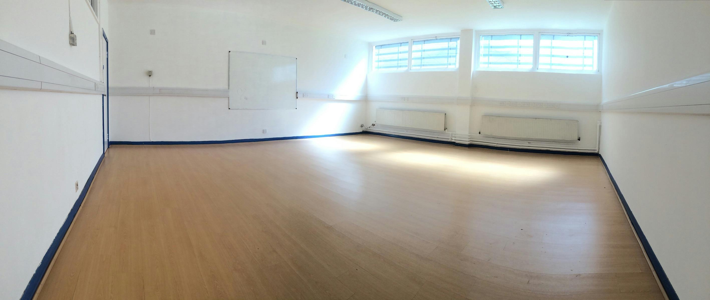 Spacious, well-lit meeting room in Centre 151, ideal for workshops and training sessions.