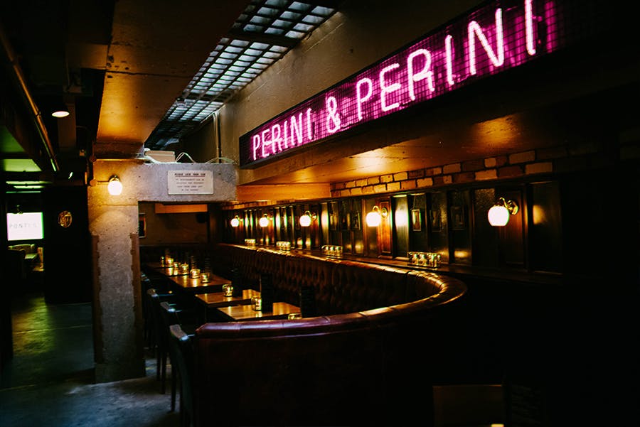 Stylish vintage bar at Perini & Perini, ideal for cocktail receptions and networking events.