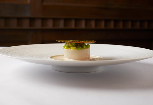 Elegant plated dish in The Clarges Suite, Flemings Mayfair Hotel for upscale events.