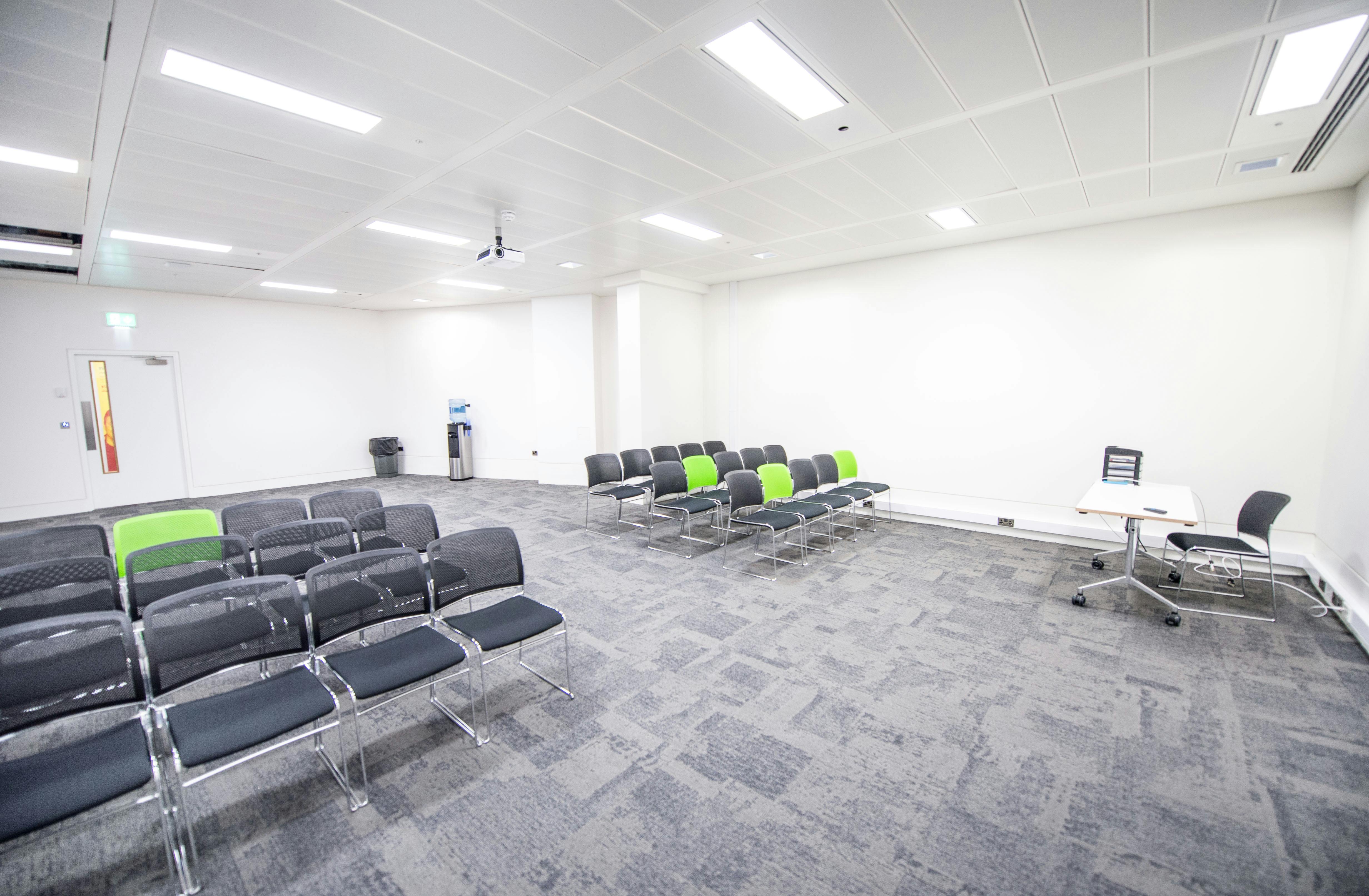 Versatile meeting space at CodeNode, ideal for workshops and presentations.