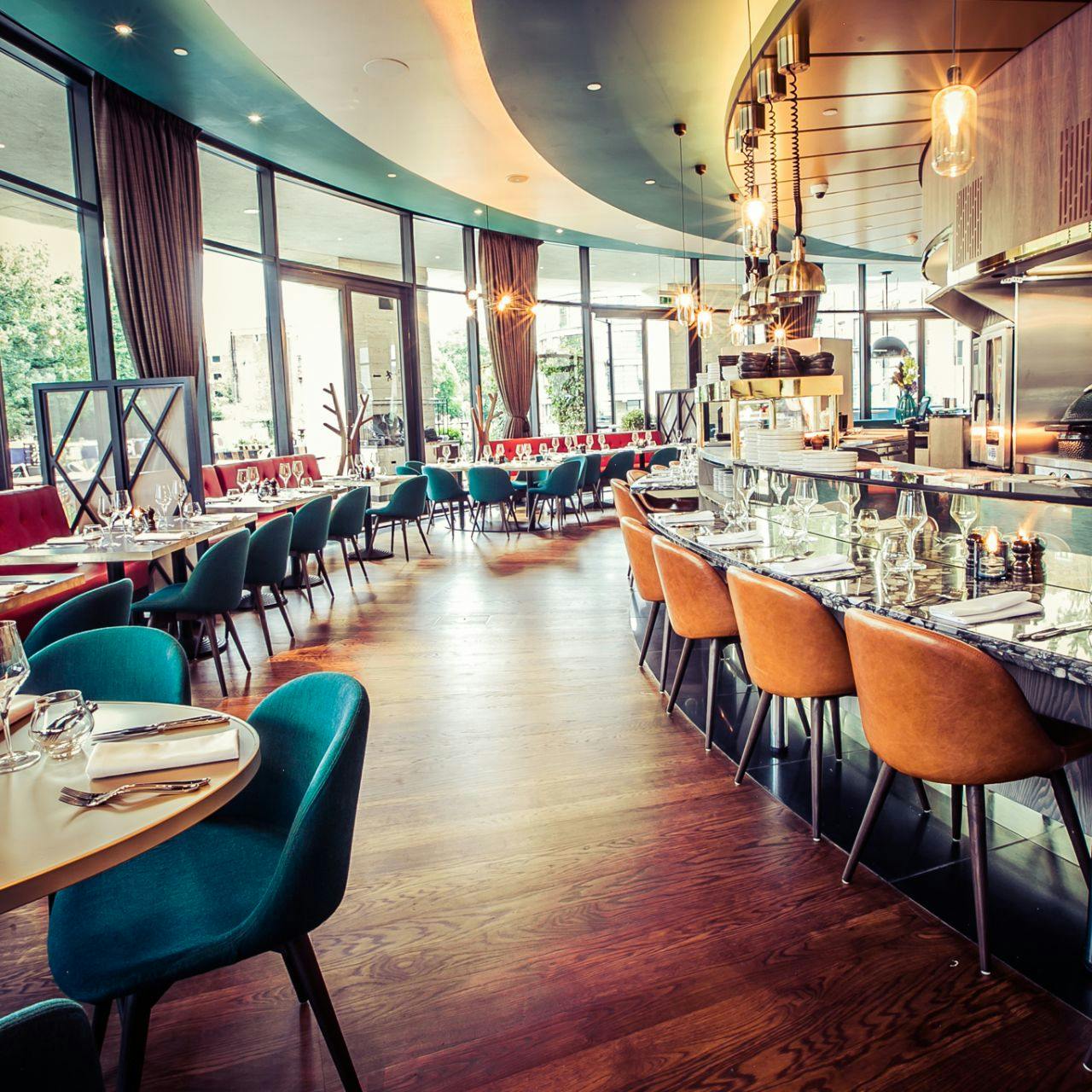Private dining area in Rotunda Bar, modern decor for intimate events and meetings.