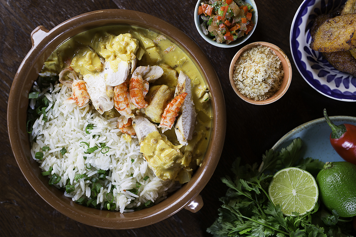 Vibrant rice, chicken, and shrimp dish at Las Iguanas Royal Festival Hall event catering. - Banner