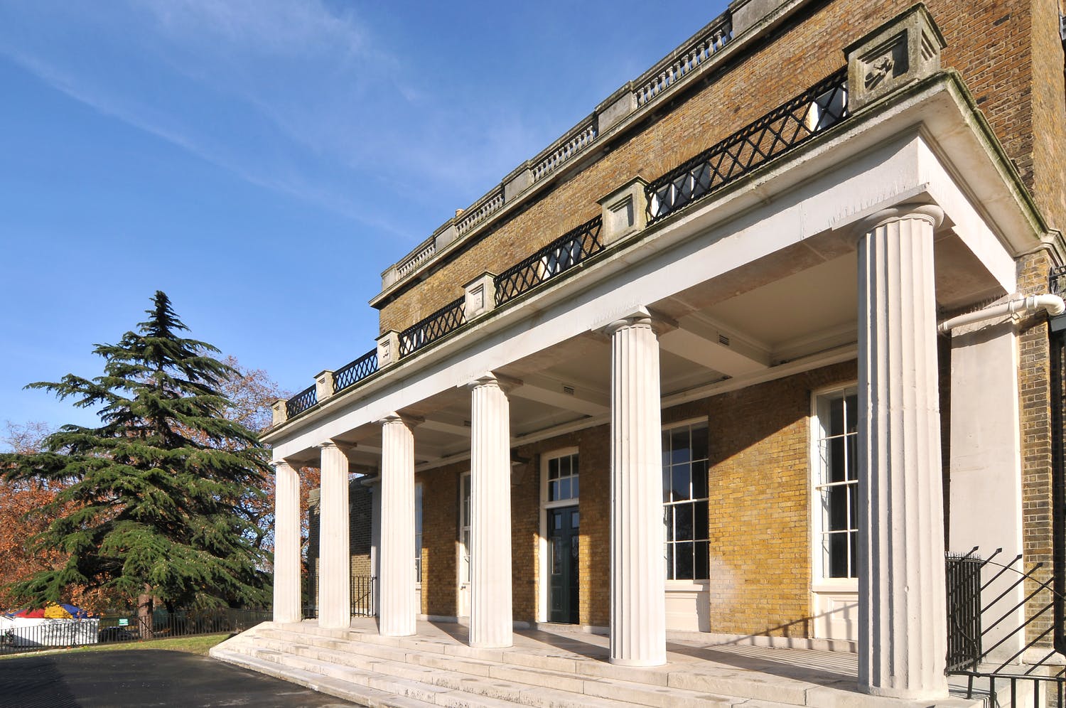 Elegant dining room in Clissold House, featuring tall columns for events and gatherings.