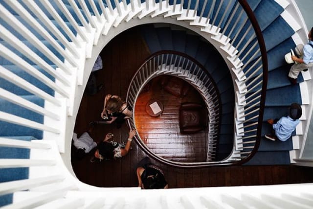 Spiral staircase in Clissold House, perfect for elegant events and gatherings.