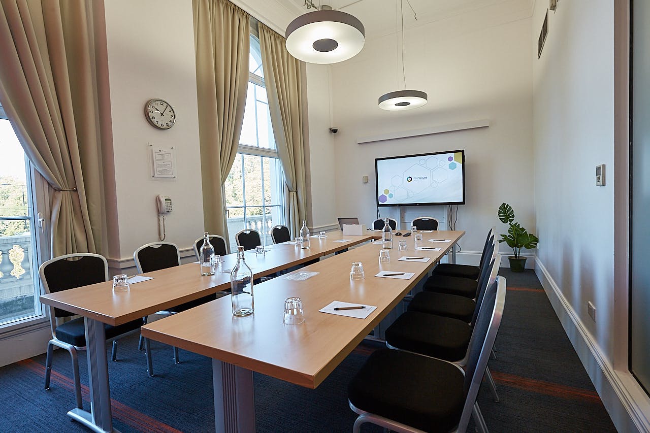 Modern meeting room at The Marylebone, ideal for professional gatherings and presentations.