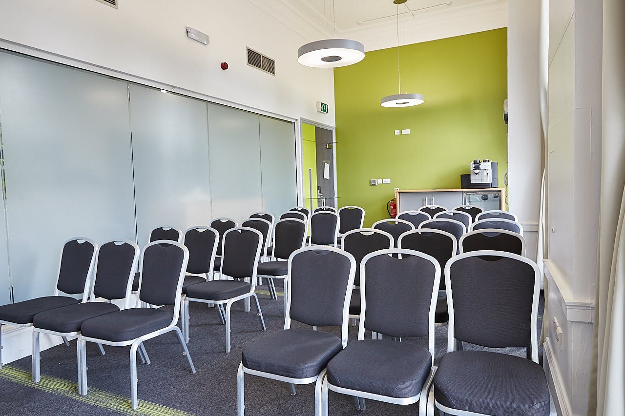 Modern meeting room at The Fitzrovia, ideal for workshops and presentations.
