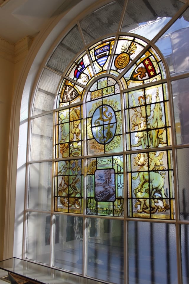 Stained glass window in Watermen's Hall's Parlour Room, ideal for elegant events.