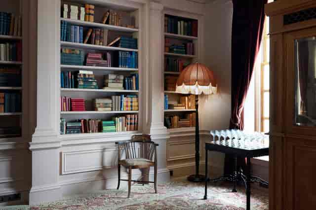 Sophisticated meeting space with cozy library for networking events at The Ned.
