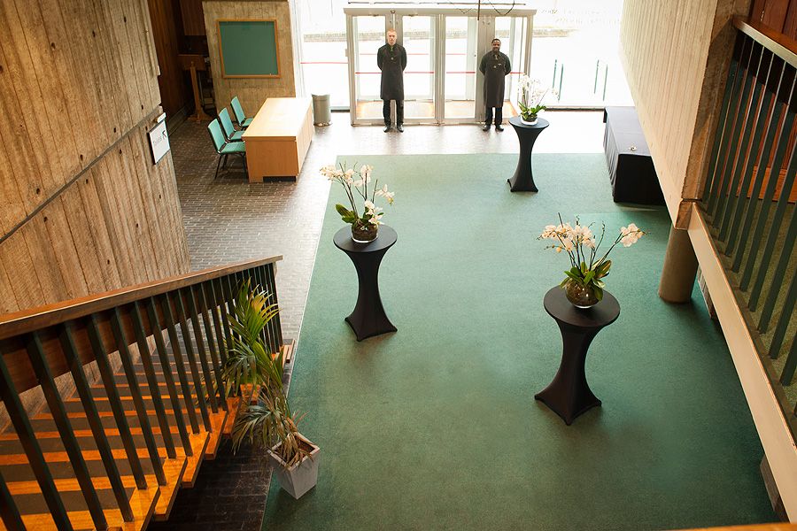 Huxley Theatre entryway with floral decor, ideal for events and networking at ZSL London Zoo. - Banner
