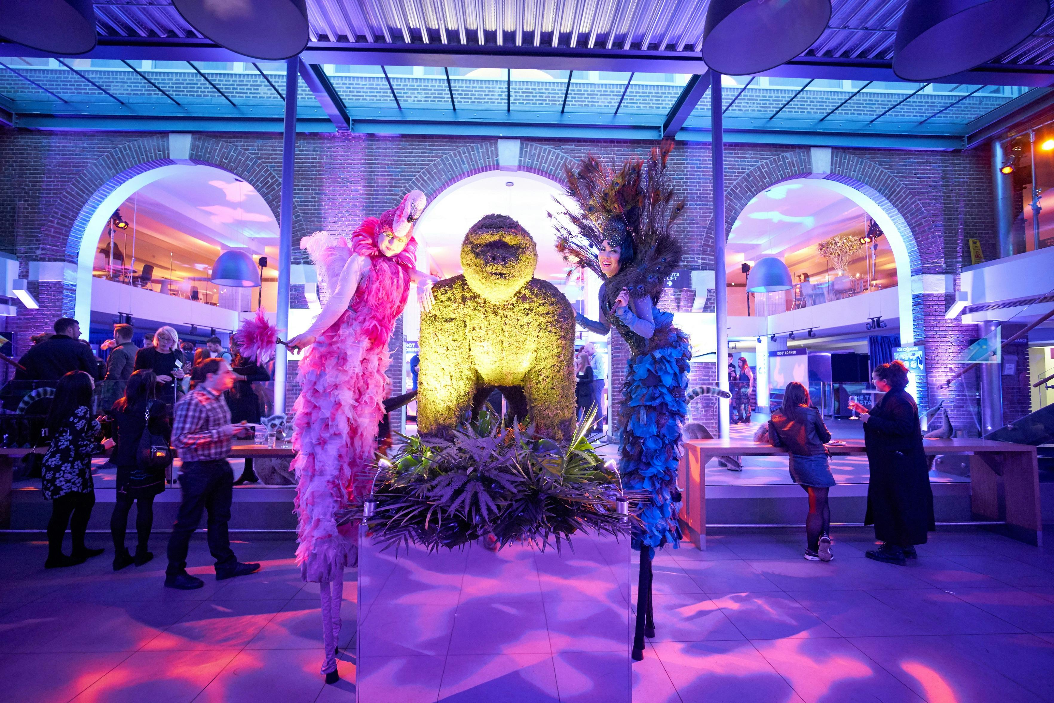 Vibrant event space at ZSL London Zoo with artistic installation for networking and socializing.