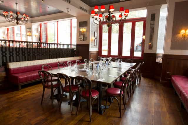 Intimate meeting space at Café Rouge St Pauls with elegant decor, perfect for gatherings.