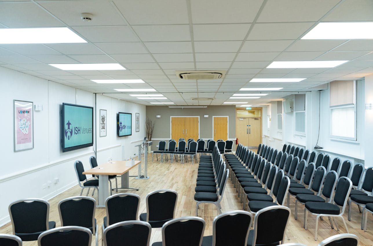 Portland meeting space with black chairs, ideal for presentations and discussions.