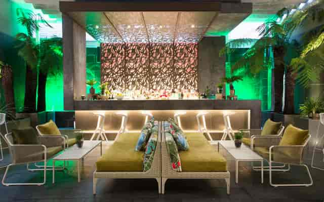 Stylish lounge in The Secret Garden, ideal for networking events and cocktail receptions.