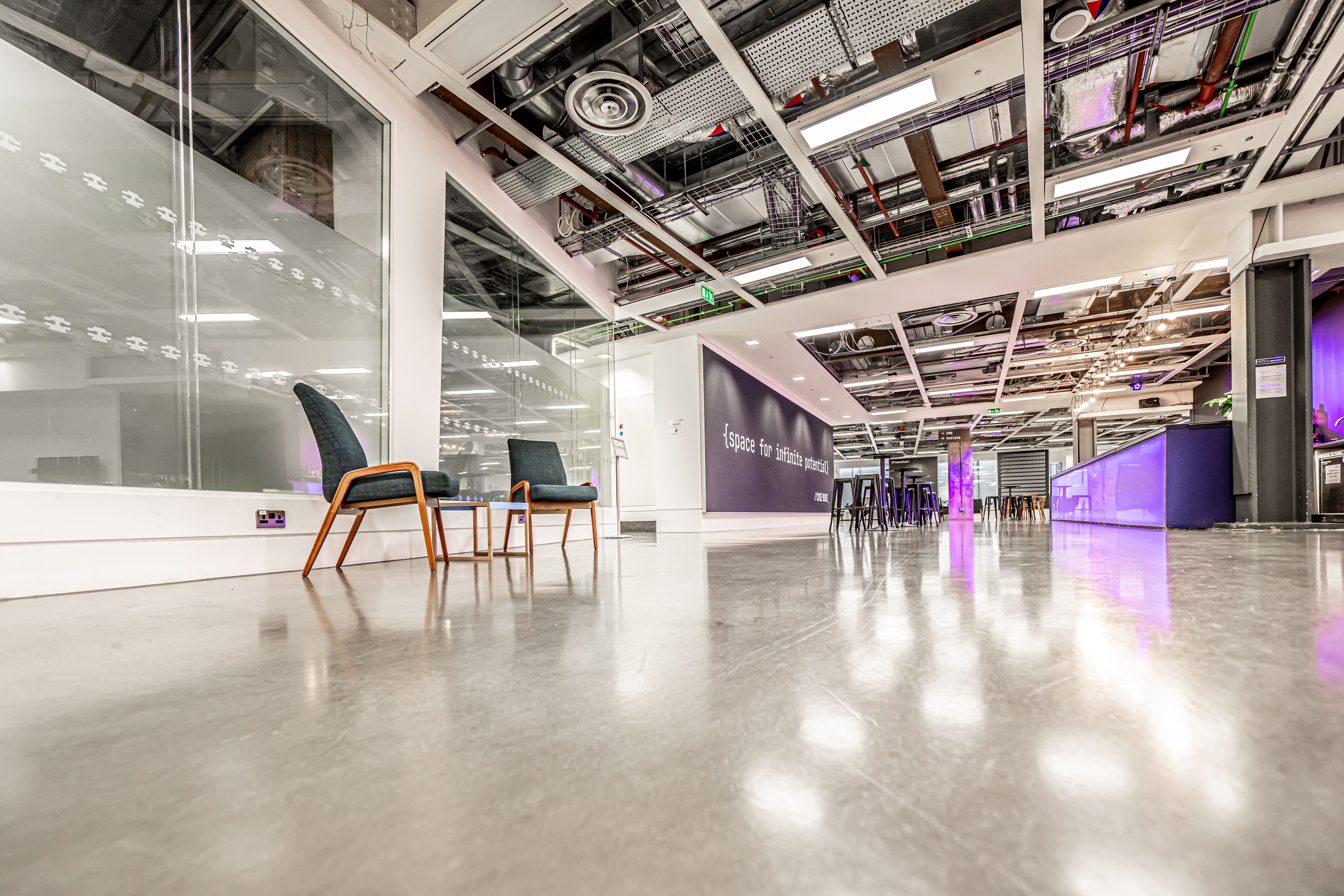 Modern breakout event space, CodeNode, natural light, workshop, networking - Banner