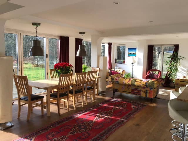 Bright meeting space in A Sussex House, ideal for retreats and brainstorming sessions.