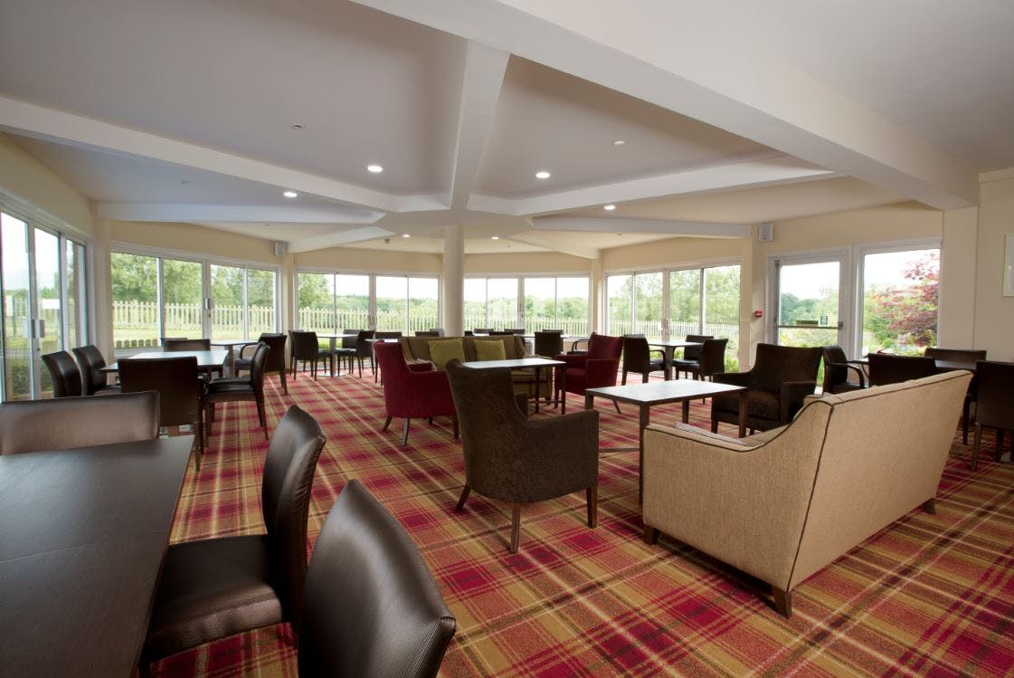 Spacious Sandford Lounge with natural light, ideal for networking events and conferences.