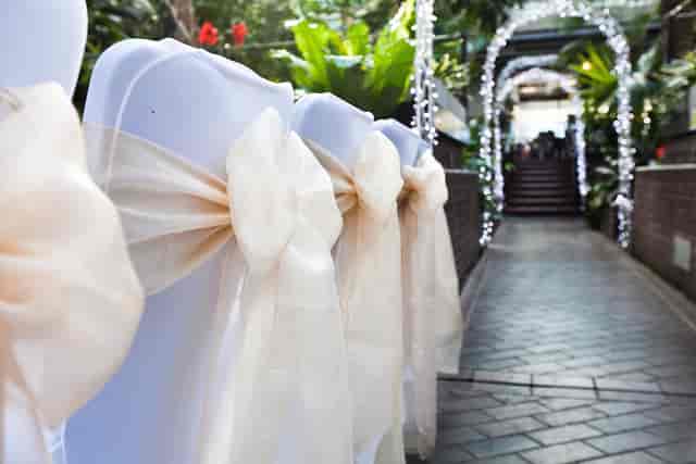 Conservatory Terrace wedding, elegant aisle, romantic reception.