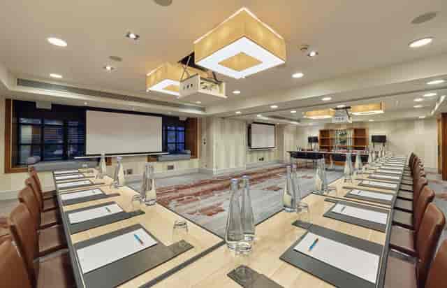 Meeting room at Sofitel London St James, featuring a long table for corporate events.