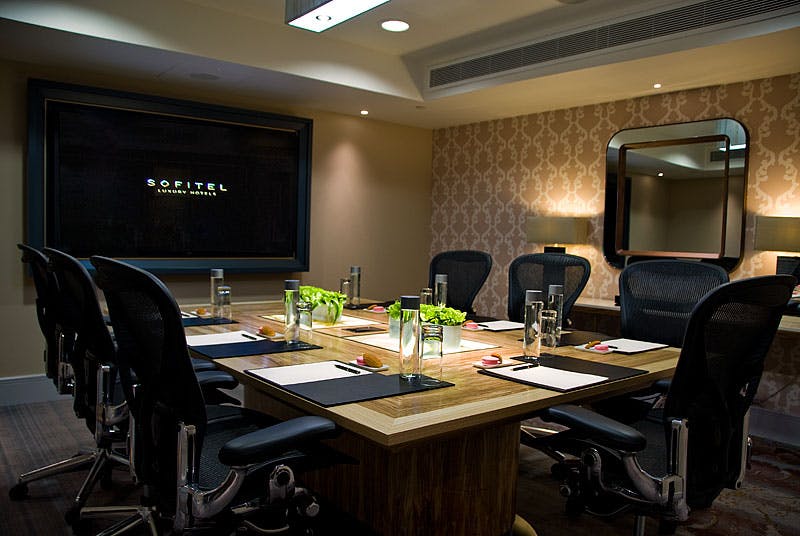 Sophisticated meeting room at Sofitel London, ideal for corporate events and discussions.