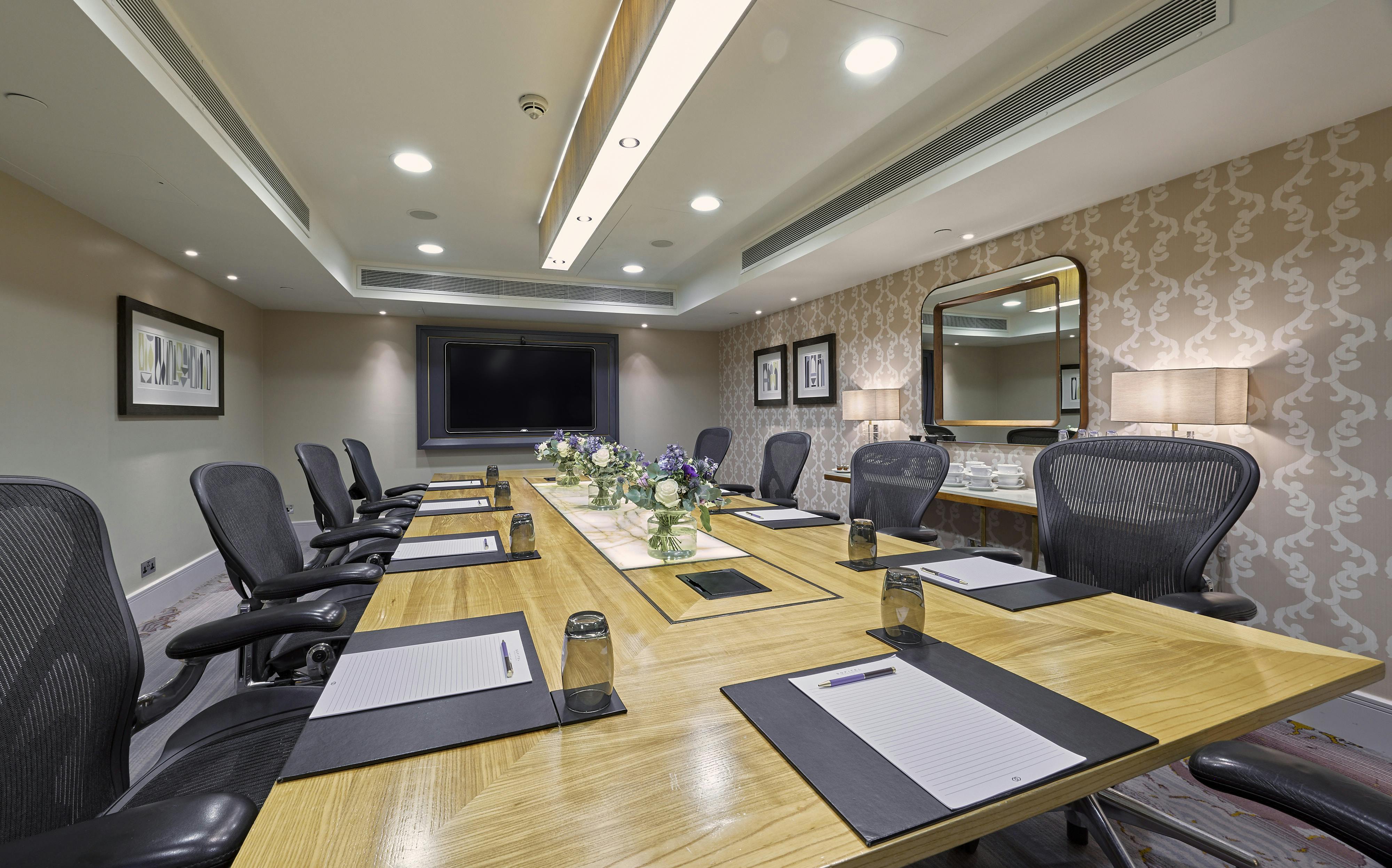 Belgravia meeting room at Sofitel London, modern design for professional events.