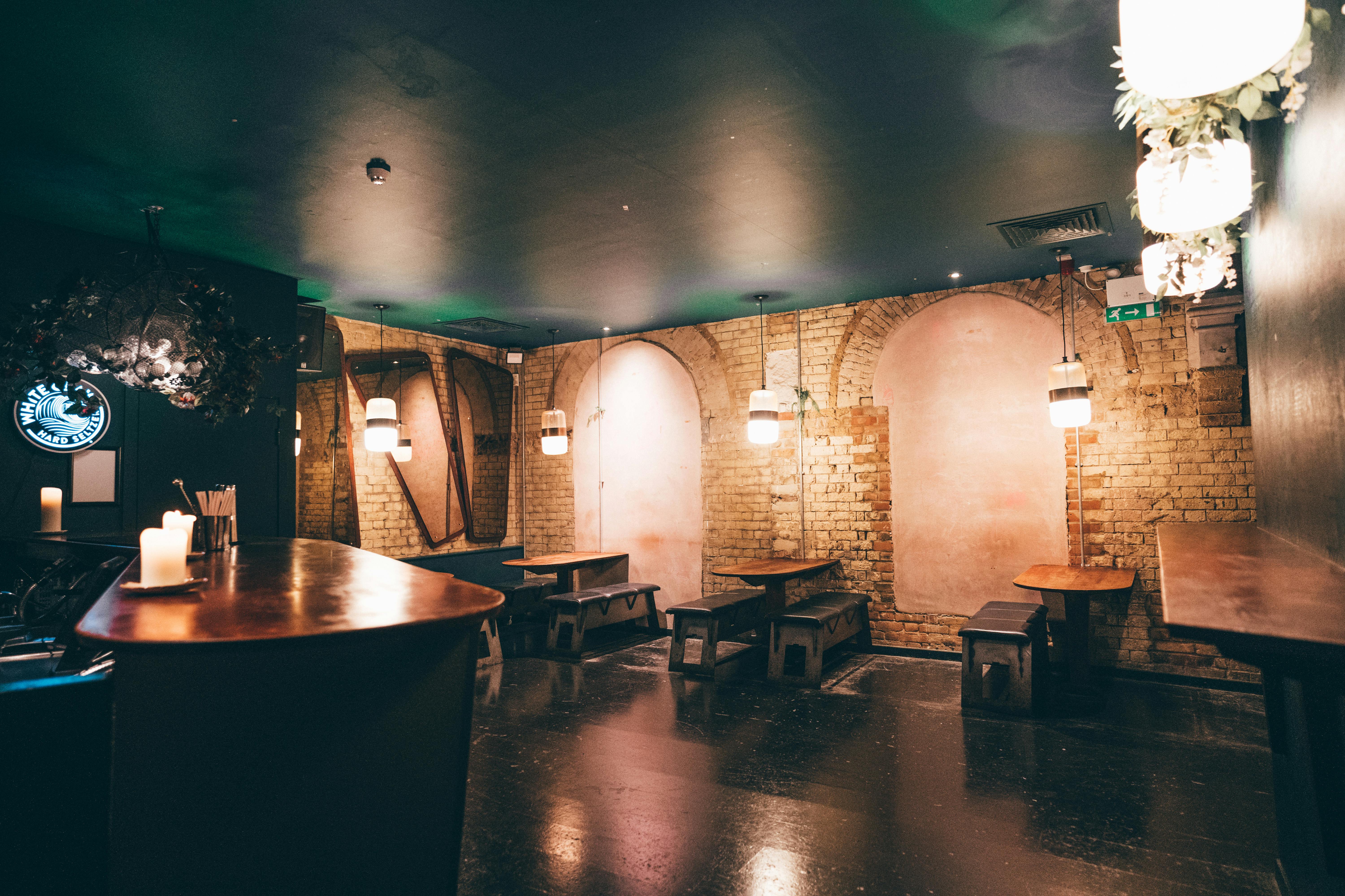 Versatile event space in Oslo Hackney with rustic charm and exposed brick walls.