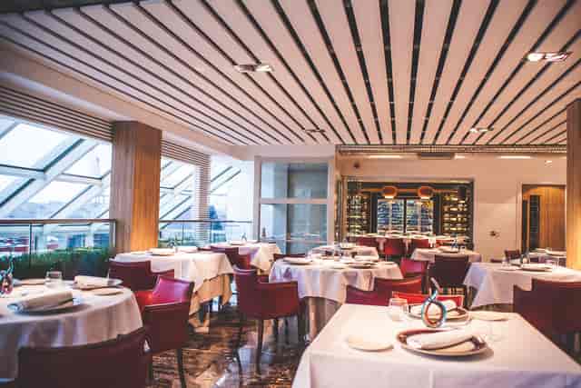 Sophisticated dining venue with elegant decor for upscale events and meetings.